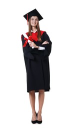 Photo of Happy young woman in graduation gown and mortarboard with diploma on white background