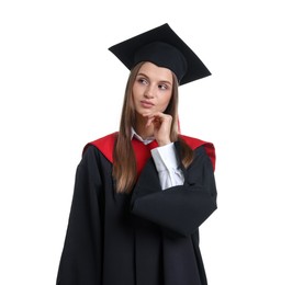 Photo of Portrait of thoughtful young woman in graduation gown and mortarboard on white background