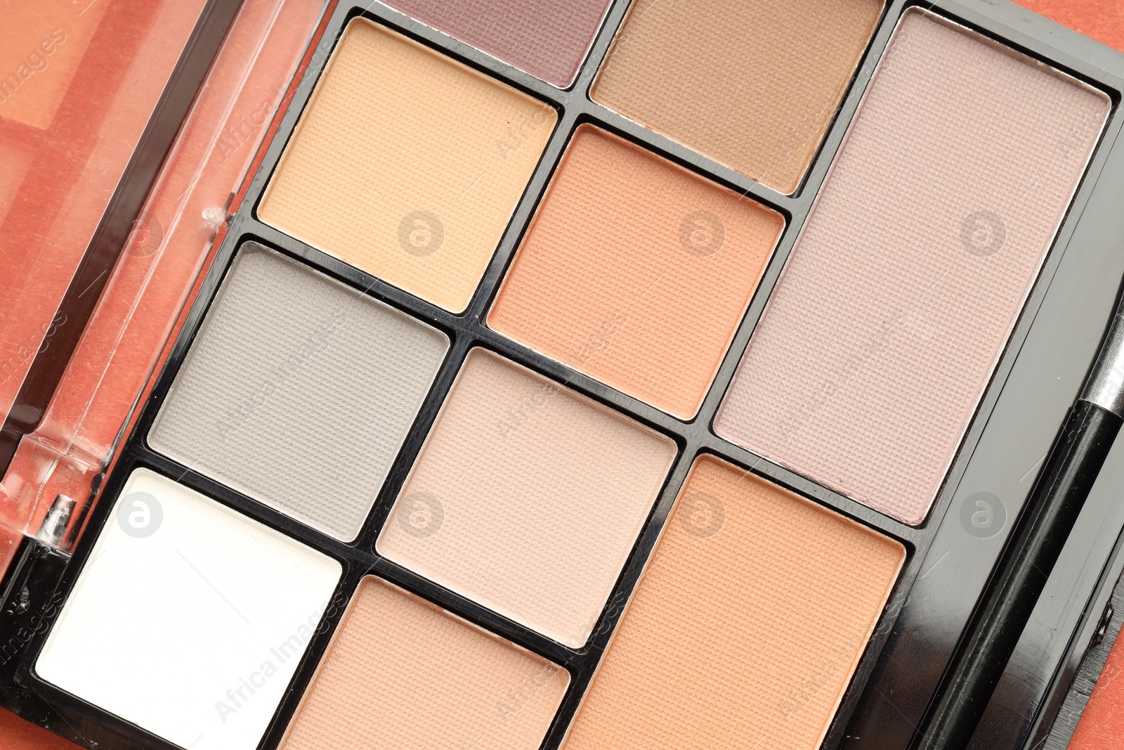 Photo of Beautiful eyeshadow palette as background, top view