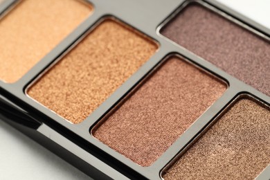 Photo of Beautiful eyeshadow palette on white background, closeup