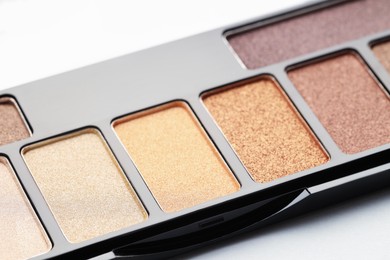 Photo of Beautiful eyeshadow palette on white background, closeup