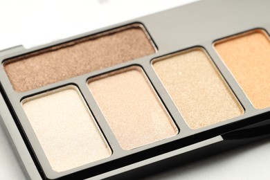 Photo of Beautiful eyeshadow palette on white background, closeup