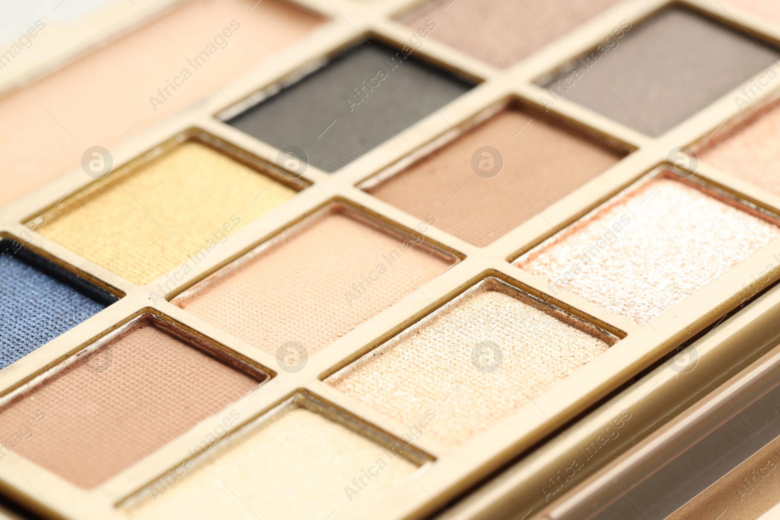 Photo of Beautiful eyeshadow palette as background, closeup. Cosmetic product
