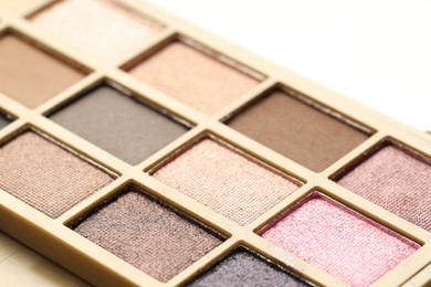 Photo of Beautiful eyeshadow palette on white background, closeup