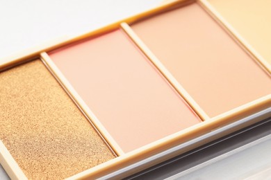 Photo of Beautiful eyeshadow palette on white background, closeup