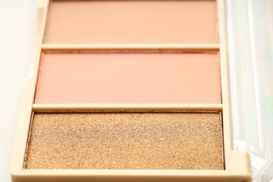 Photo of Beautiful eyeshadow palette on white background, closeup