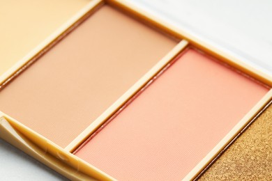 Photo of Beautiful eyeshadow palette on white background, closeup