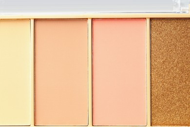 Photo of Beautiful eyeshadow palette as background, top view