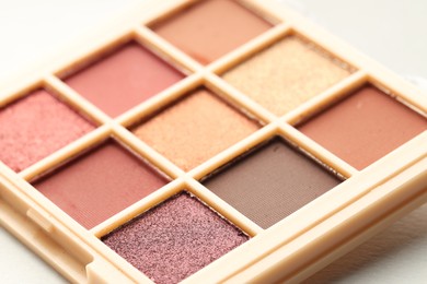Photo of Beautiful eyeshadow palette on white background, closeup
