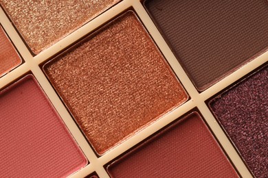 Photo of Beautiful eyeshadow palette as background, top view