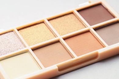 Photo of Beautiful eyeshadow palette on white background, closeup