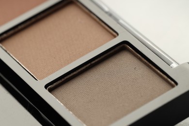 Photo of Beautiful eyeshadow palette on white background, closeup