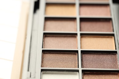 Photo of Beautiful eyeshadow palette on white background, closeup