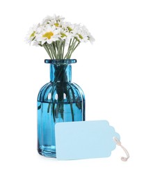 Photo of Blank card and vase with flowers isolated on white