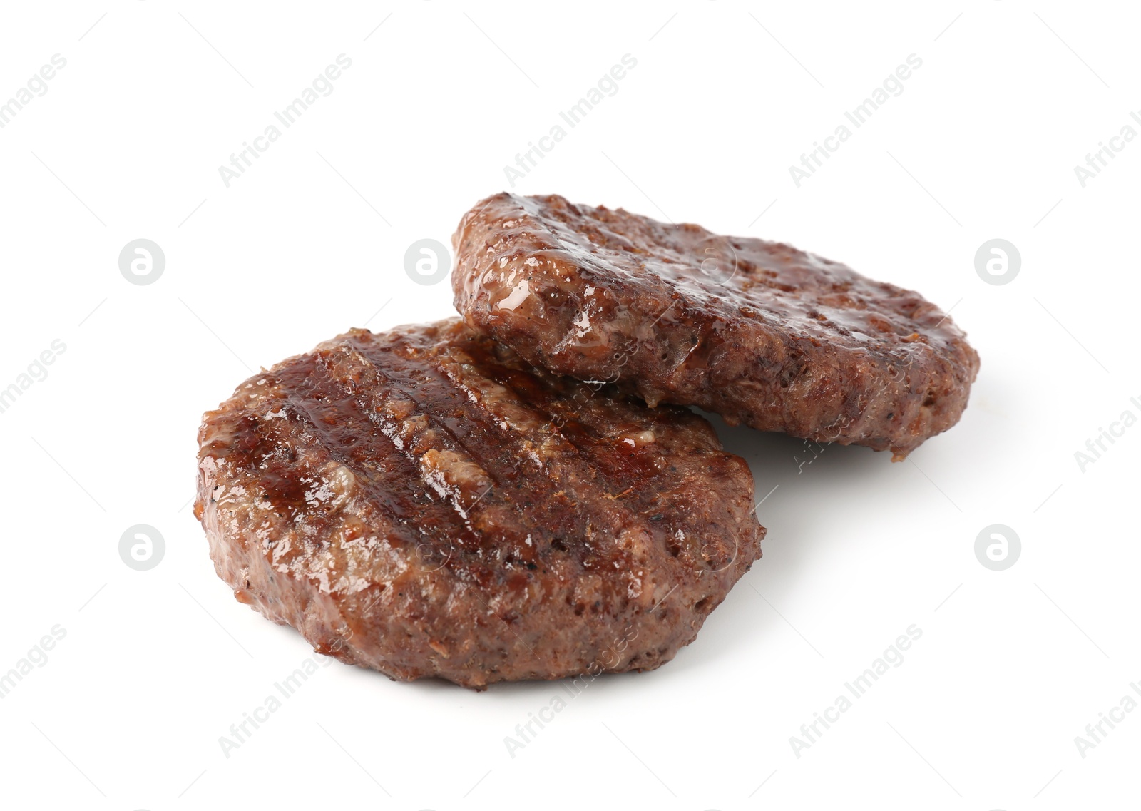 Photo of Delicious grilled beef patties isolated on white