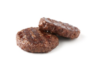 Photo of Delicious grilled beef patties isolated on white