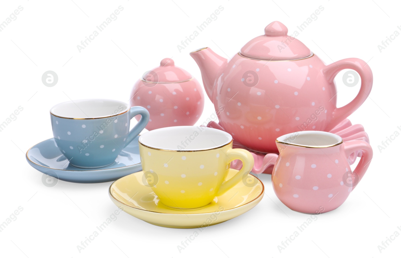 Photo of Beautiful tea set isolated on white. Child's toy