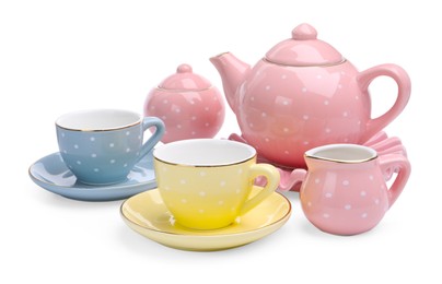 Photo of Beautiful tea set isolated on white. Child's toy