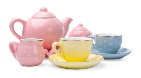 Photo of Beautiful tea set isolated on white. Child's toy