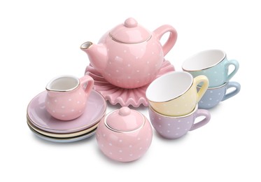 Photo of Beautiful tea set isolated on white. Child's toy