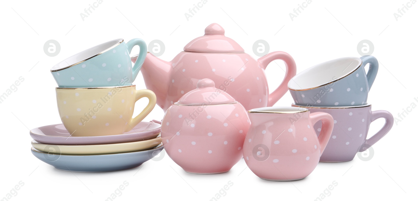 Photo of Beautiful tea set isolated on white. Child's toy