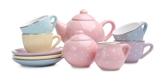 Photo of Beautiful tea set isolated on white. Child's toy
