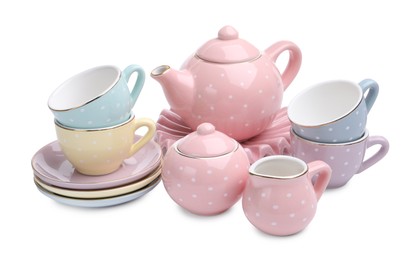 Photo of Beautiful tea set isolated on white. Child's toy