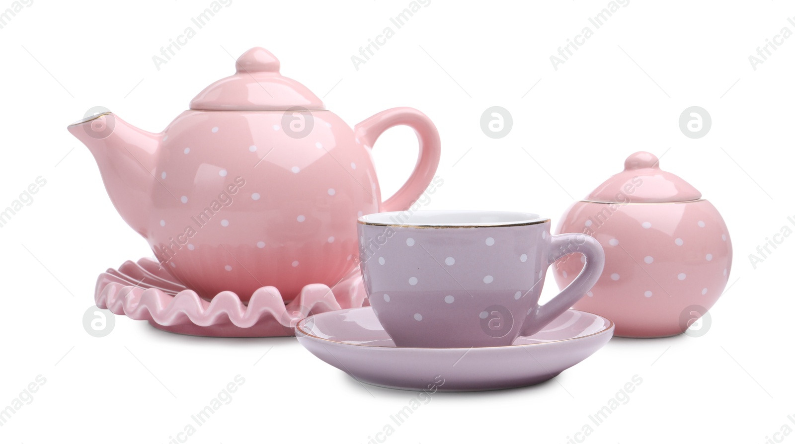 Photo of Beautiful tea set isolated on white. Child's toy