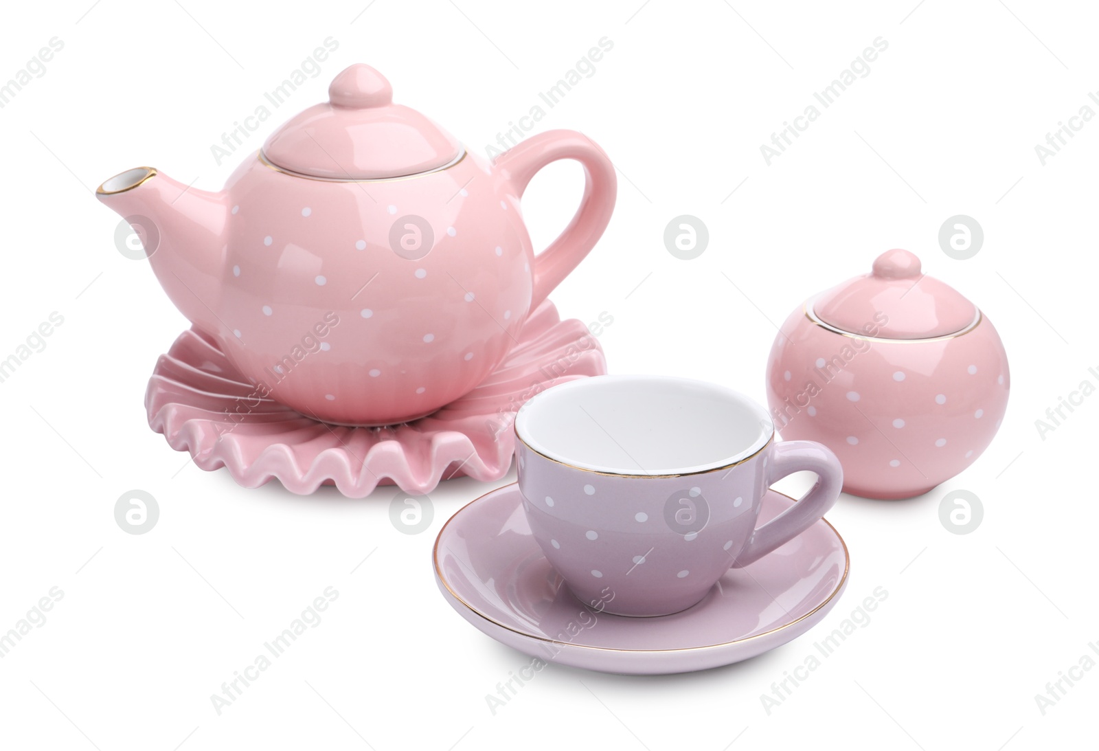 Photo of Beautiful tea set isolated on white. Child's toy