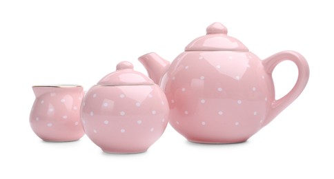 Photo of Beautiful tea set isolated on white. Child's toy