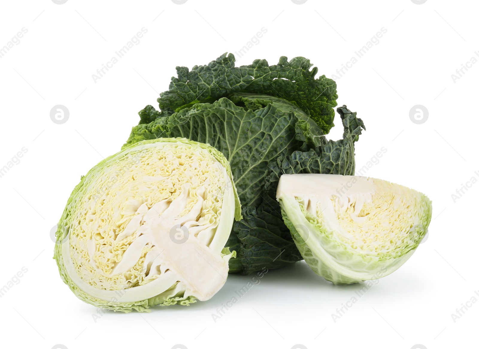 Photo of Whole and cut fresh Savoy cabbages isolated on white