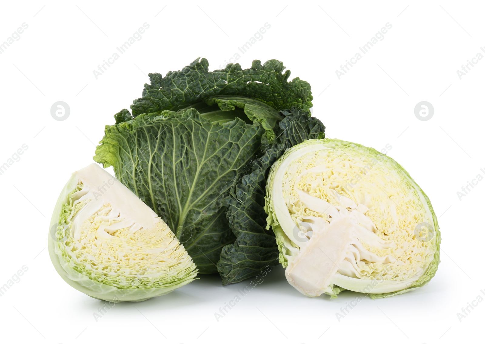 Photo of Whole and cut fresh Savoy cabbages isolated on white