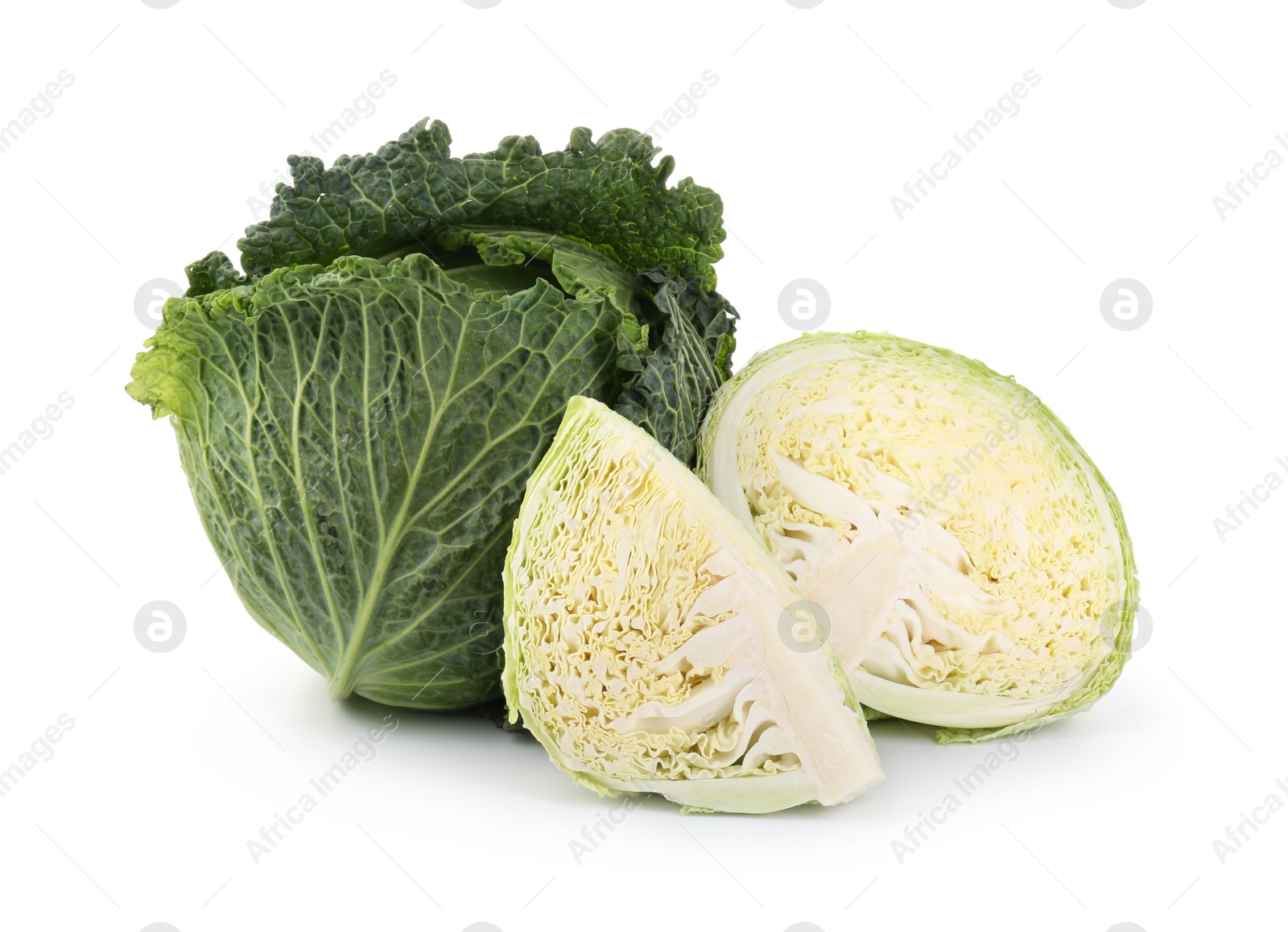 Photo of Whole and cut fresh Savoy cabbages isolated on white