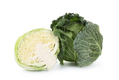 Photo of Whole and cut fresh Savoy cabbages isolated on white
