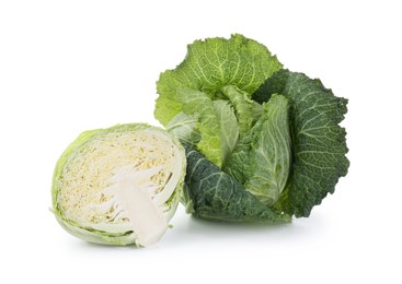 Photo of Whole and cut fresh Savoy cabbages isolated on white
