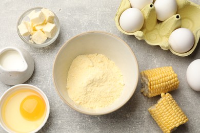 Photo of Cornbread preparation. Different ingredients on light grey table, flat lay