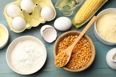 Photo of Cornbread preparation. Different ingredients on light blue wooden table, flat lay