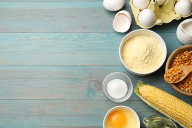 Photo of Cornbread preparation. Different ingredients on light blue wooden table, flat lay. Space for text