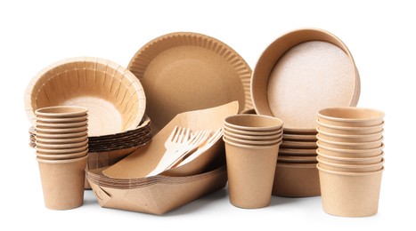 Photo of Set of disposable tableware isolated on white