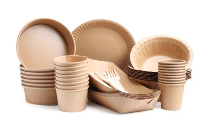 Photo of Set of disposable tableware isolated on white