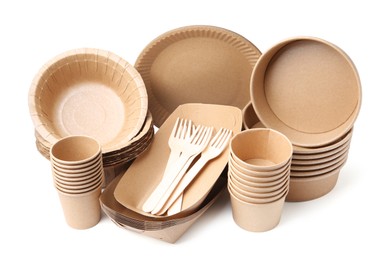 Photo of Set of disposable tableware isolated on white