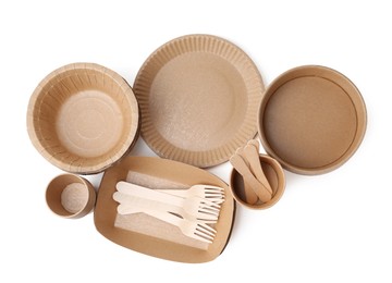Photo of Set of disposable tableware isolated on white, top view