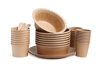 Photo of Set of disposable tableware isolated on white