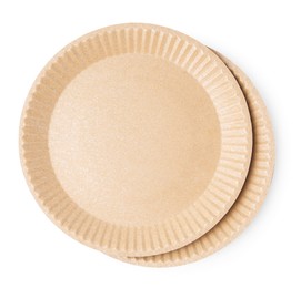 Photo of Set of disposable plates isolated on white, top view