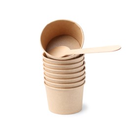Photo of Disposable cup and wooden spoon isolated on white