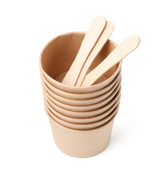 Photo of Set of disposable cups and wooden sticks isolated on white