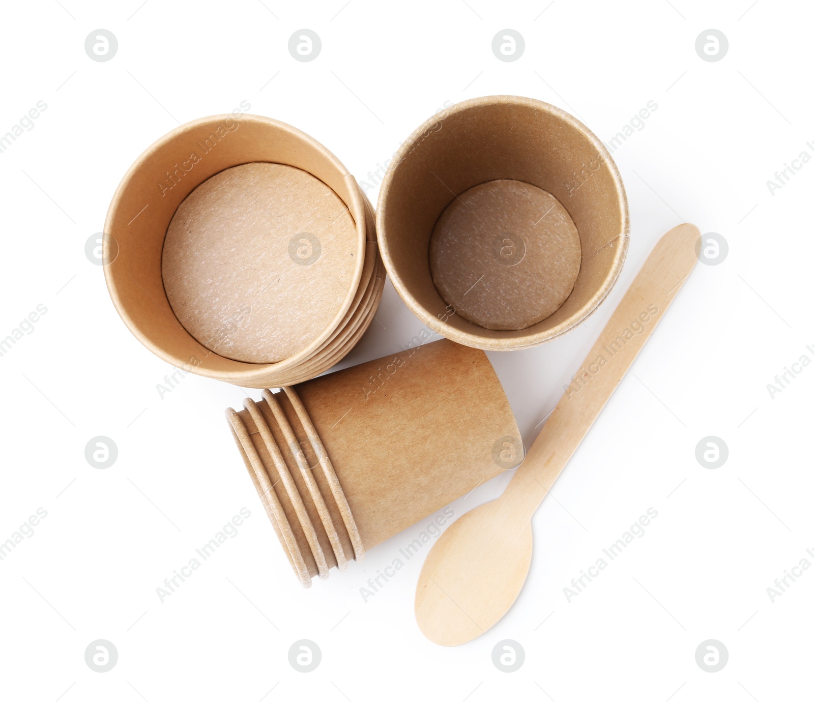 Photo of Set of disposable cups and wooden spoon isolated on white, top view