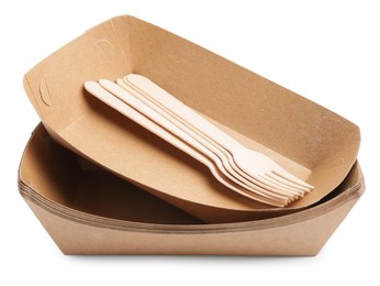 Photo of Set of disposable containers and wooden forks isolated on white