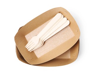 Photo of Set of disposable containers and wooden forks isolated on white, top view