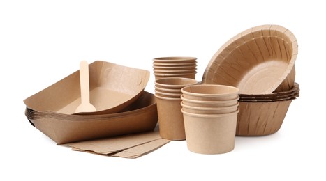Photo of Set of disposable tableware isolated on white